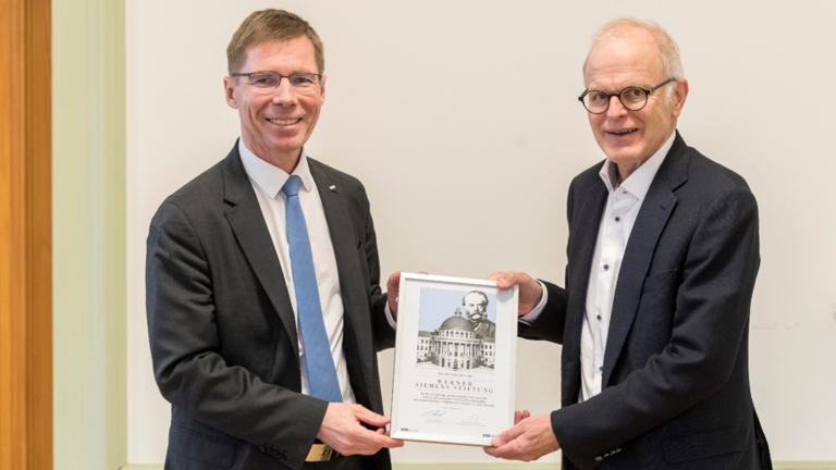 Photo with ETH President Joël Mesot and Hubert Keiber, Chairman of the Board of Trustees of the Werner Siemens Foundation.