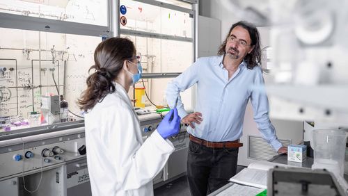 Materials scientist Francesco Stellacci with a medical specialist.