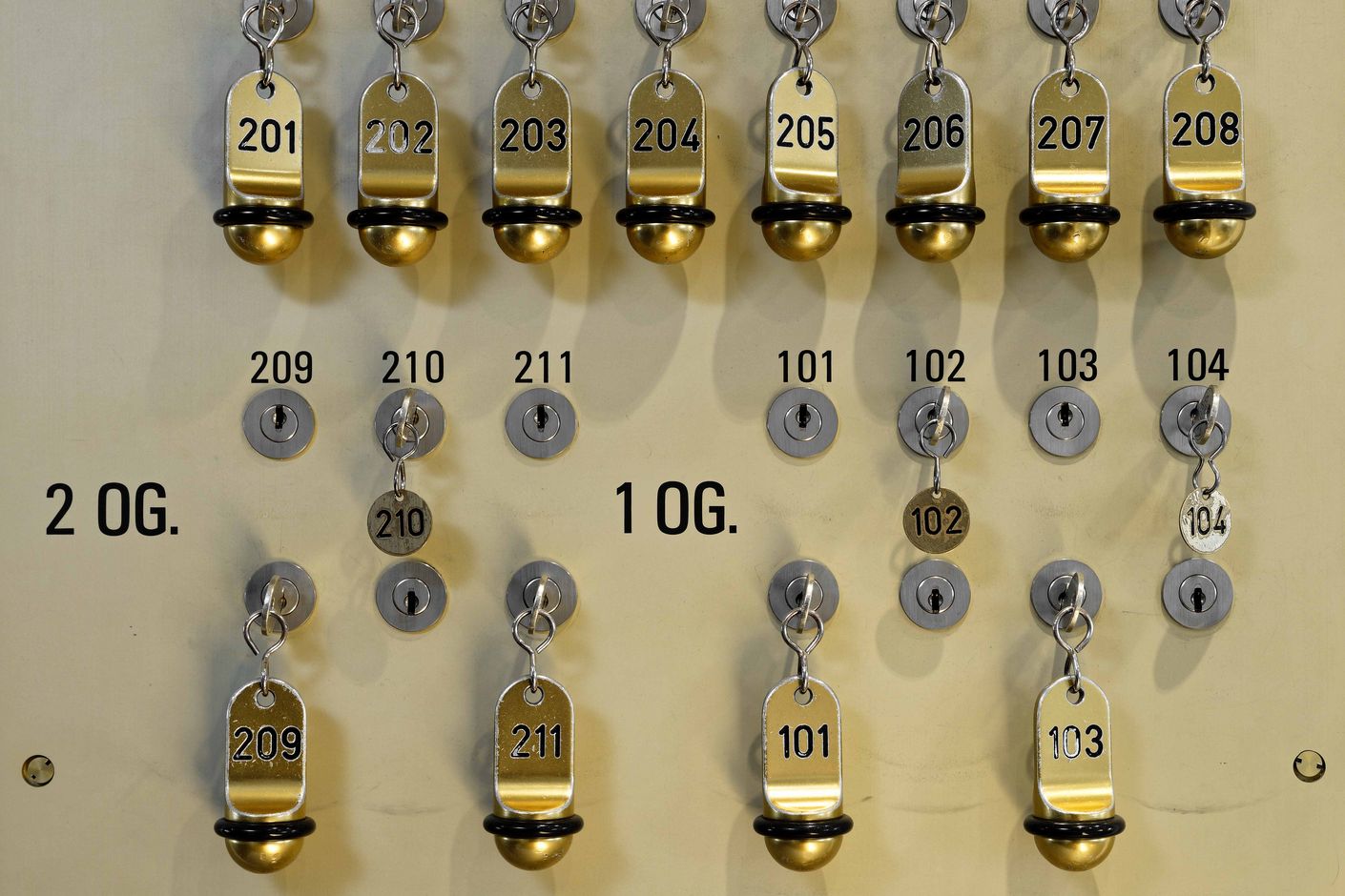 Every key in its own place—in future, a link to a physical space will make the internet safer. Key board in a hotel.
