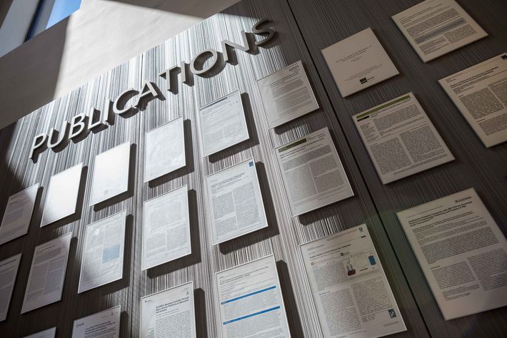 A wall of framed scientific papers is testimony to the successful research collaboration at IST Austria.