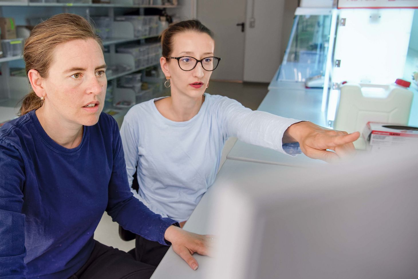 Photo of Christina Warinner and a partner during work.