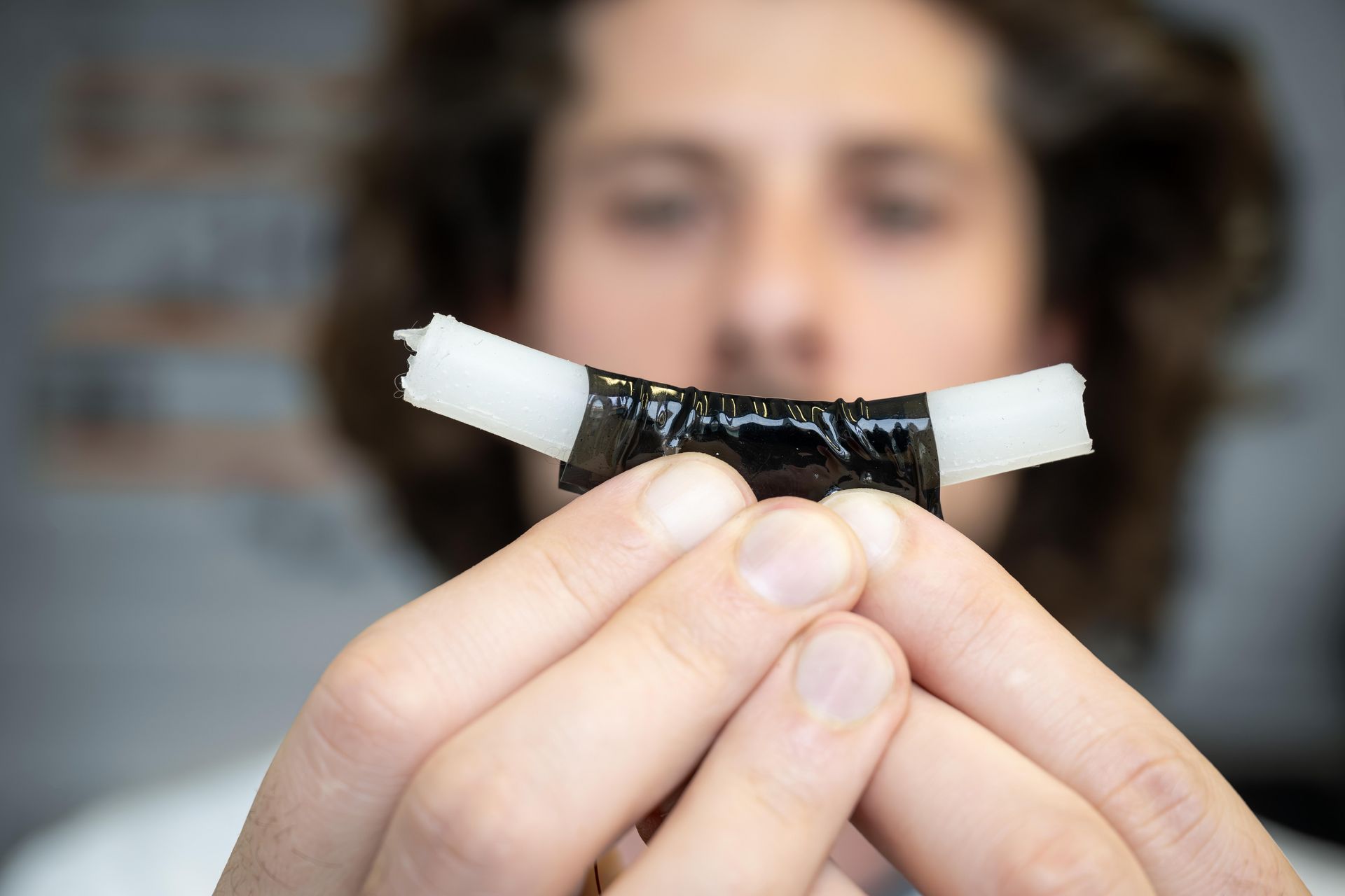 The researchers plan to use the artificial muscle (black) to squeeze and then relax the urethra. The artificial muscle