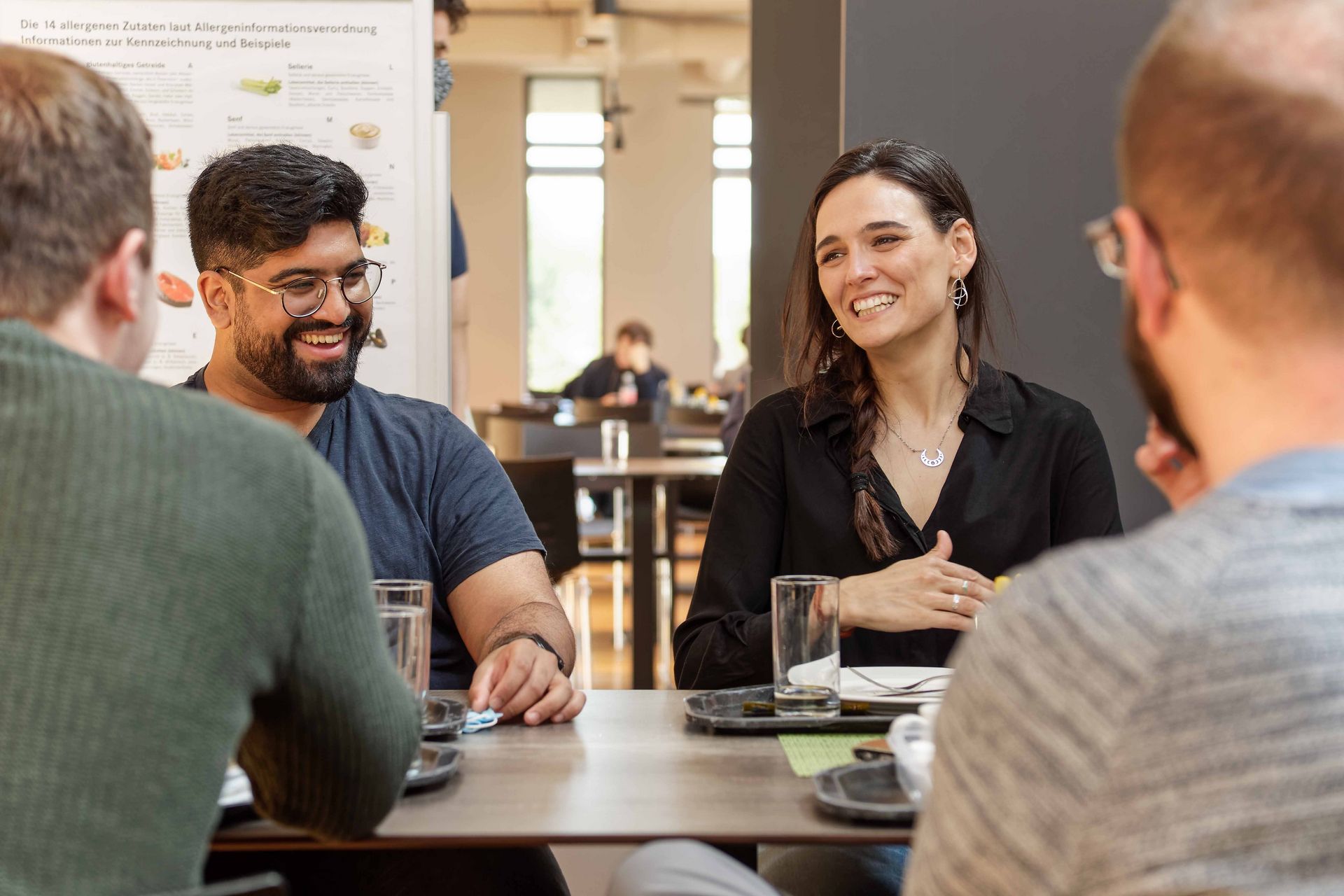 Having lunch together at IST Austria’s modern cafeteria: research leader Maria Ibáñez and her team. Research leader Maria Ibáñez and her team.
